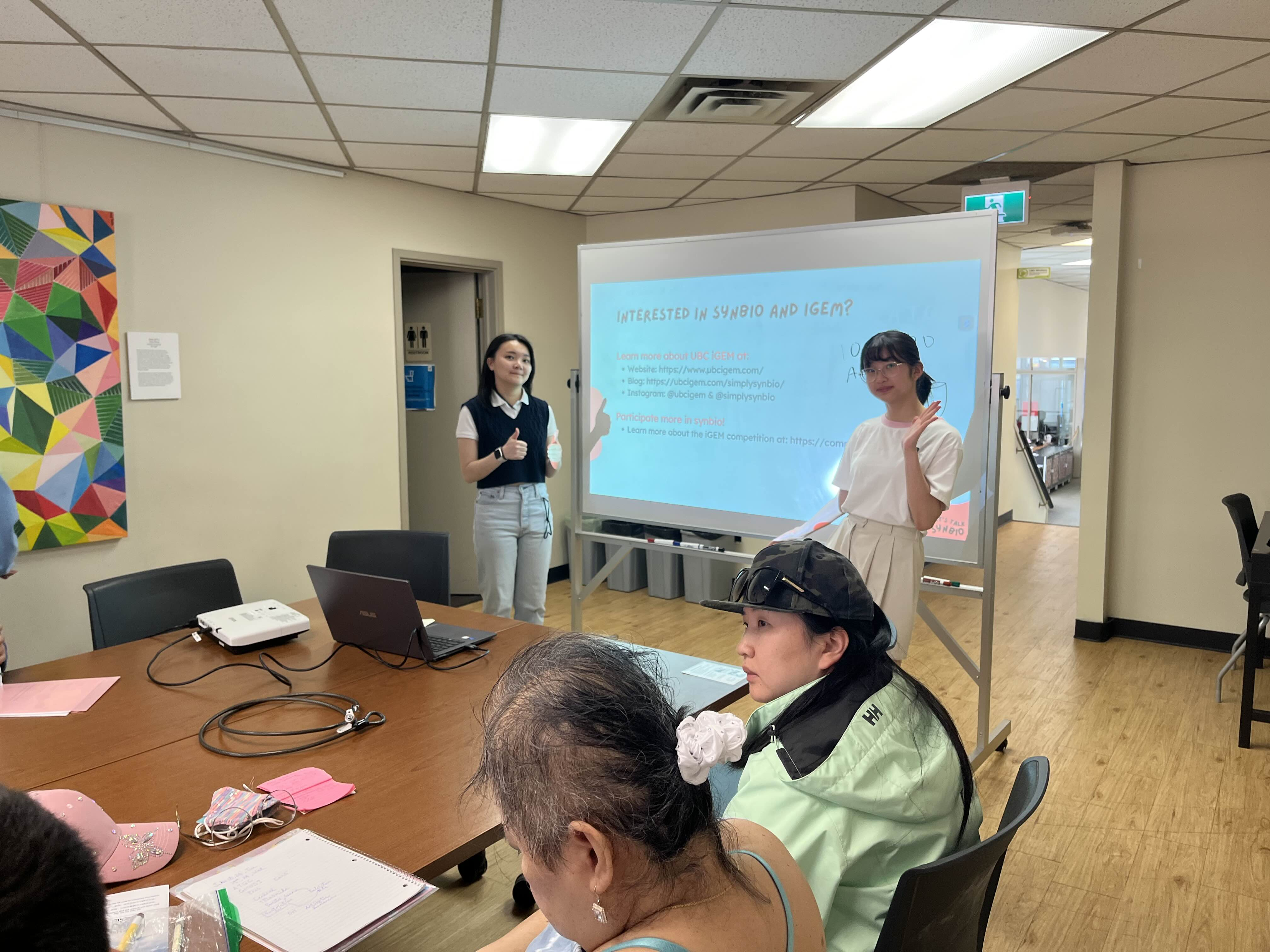 The 2024 UBC iGEM Human Practices team leading a GMO workshop at Science 101, a free science summer course for adults at UBC.