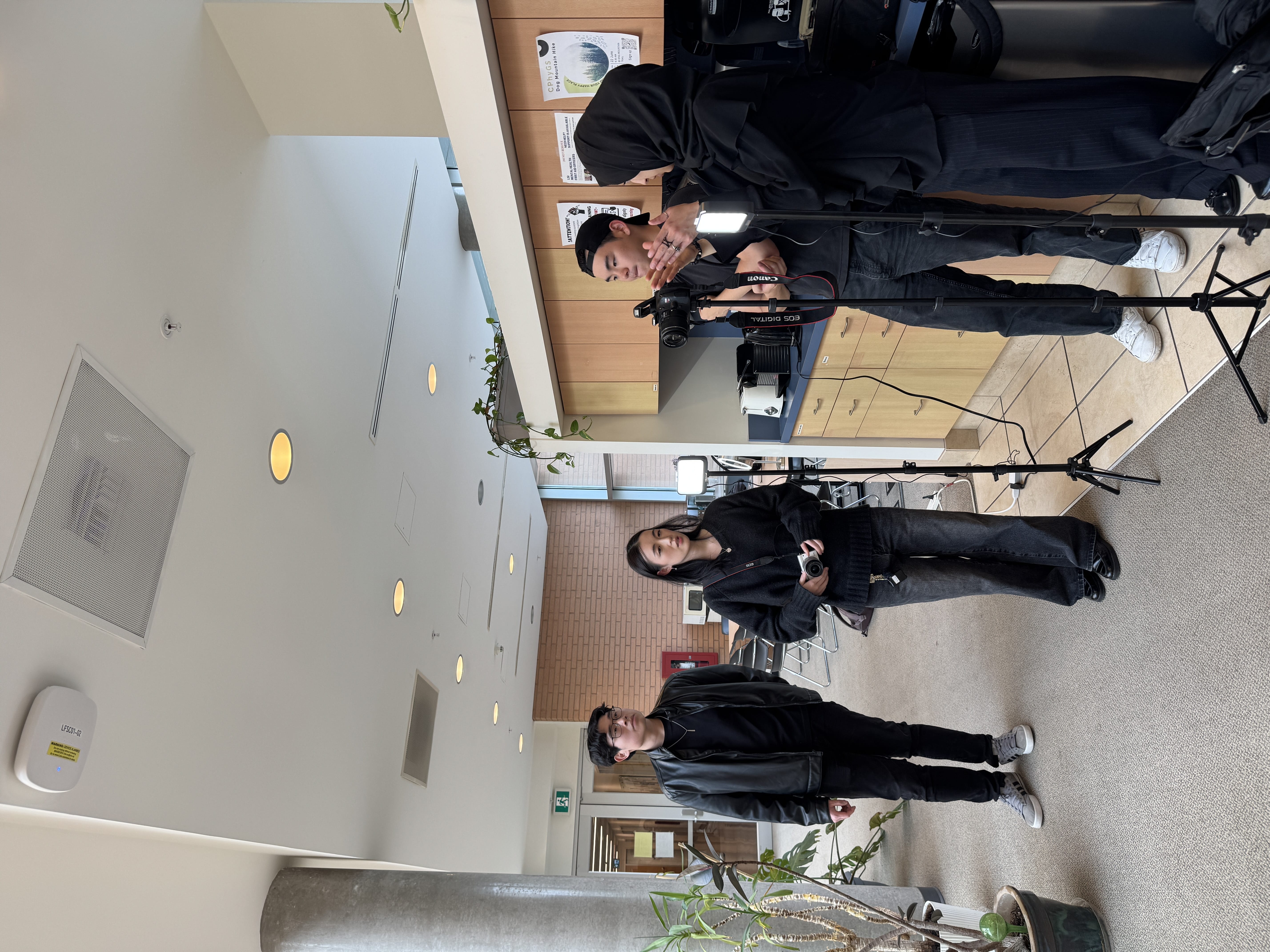 The design-wiki team setting up to take headshots of the team.